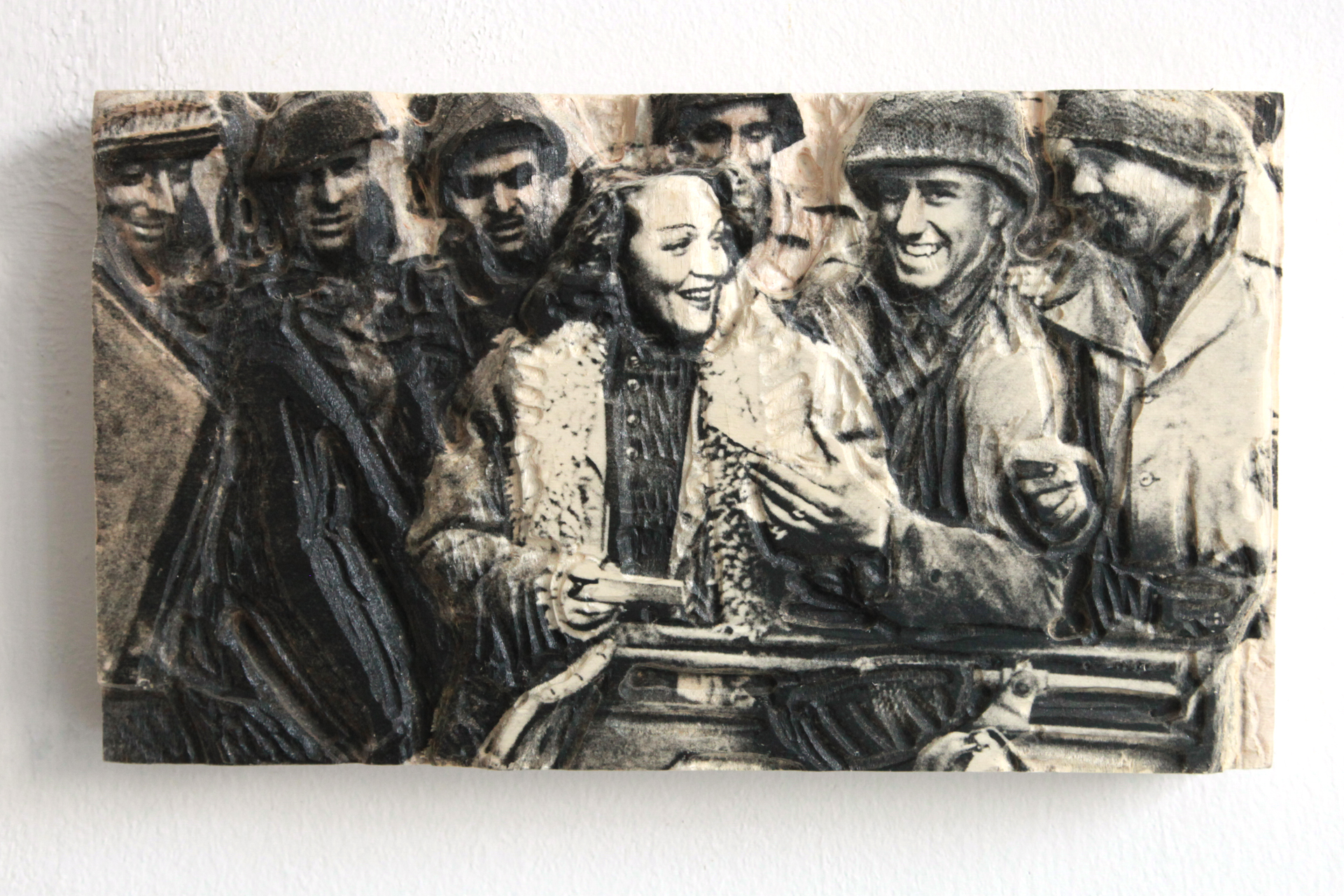 <b/> Marlene Dietrich with American Soldiers, 2013″></p>
<h6><b> Marlene Dietrich, </b>2013</h6>
<p>23 x 40 x 7cm, photographic emulsion on wood relief</p>
<div>
<p><strong>Original:</strong> M. Dietrich distributes her autographs to American soldiers after her appearance at the front, 1943, Scherl/SZ-Photo/APA-PictureDesk, <span>photo credits: ©Ilse Haider</span></p>
</div>
<p><a href=